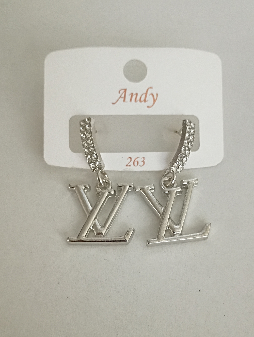 New Silver Tone Logo Dangle Earrings with Rhinestone Huggies